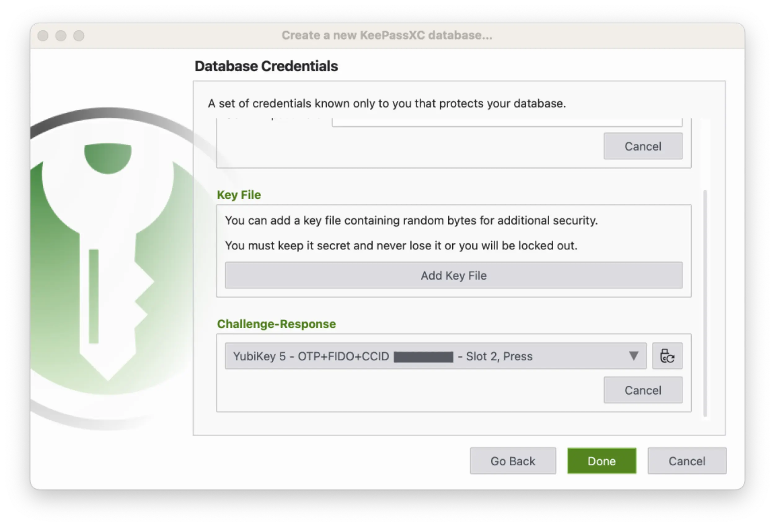 Screenshot of the KeePassXC application showing the popup to Create a new KeePassXC database in the Database Credentials section when a YubiKey is plugged in.