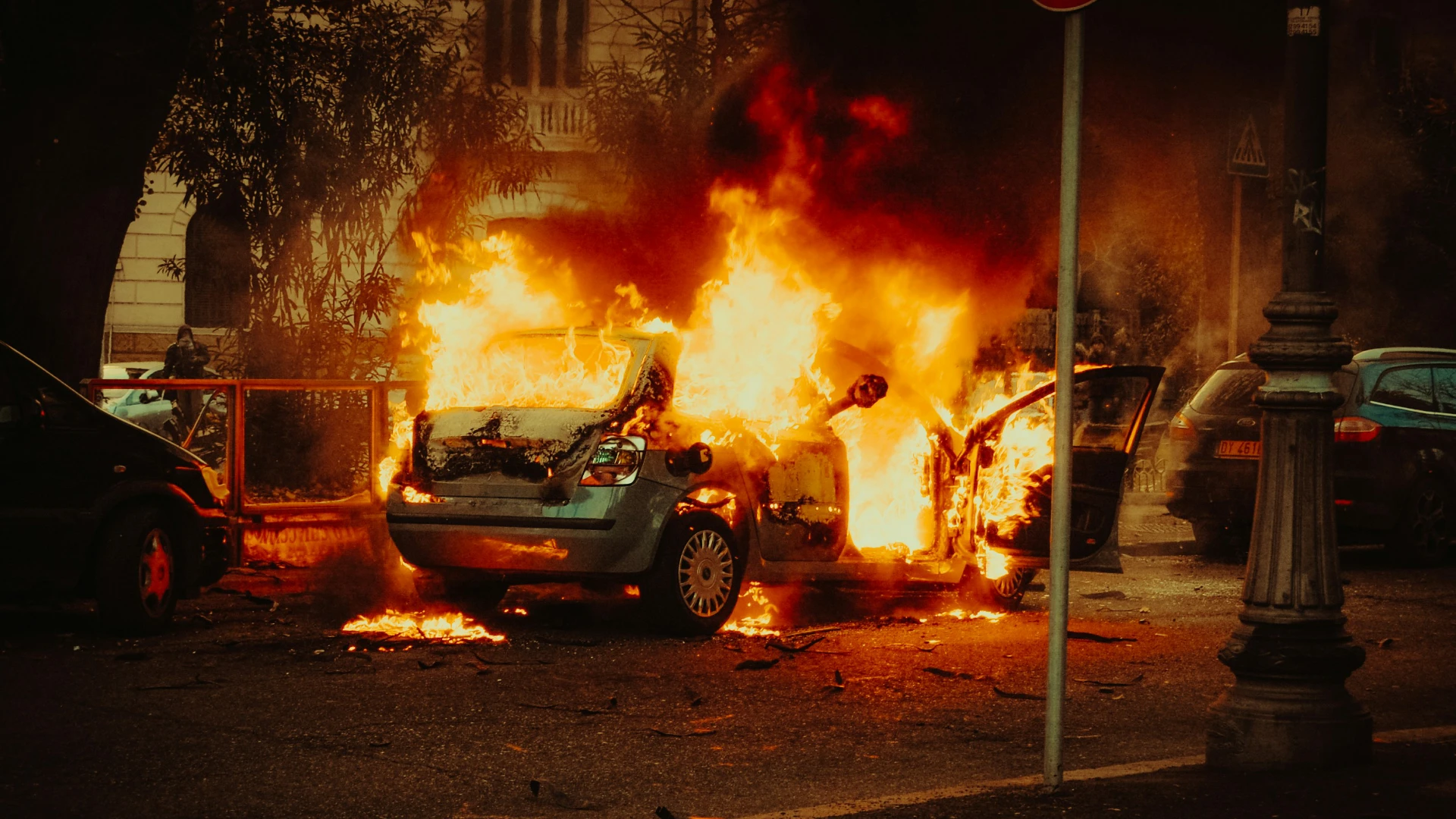 An image showing a burning car