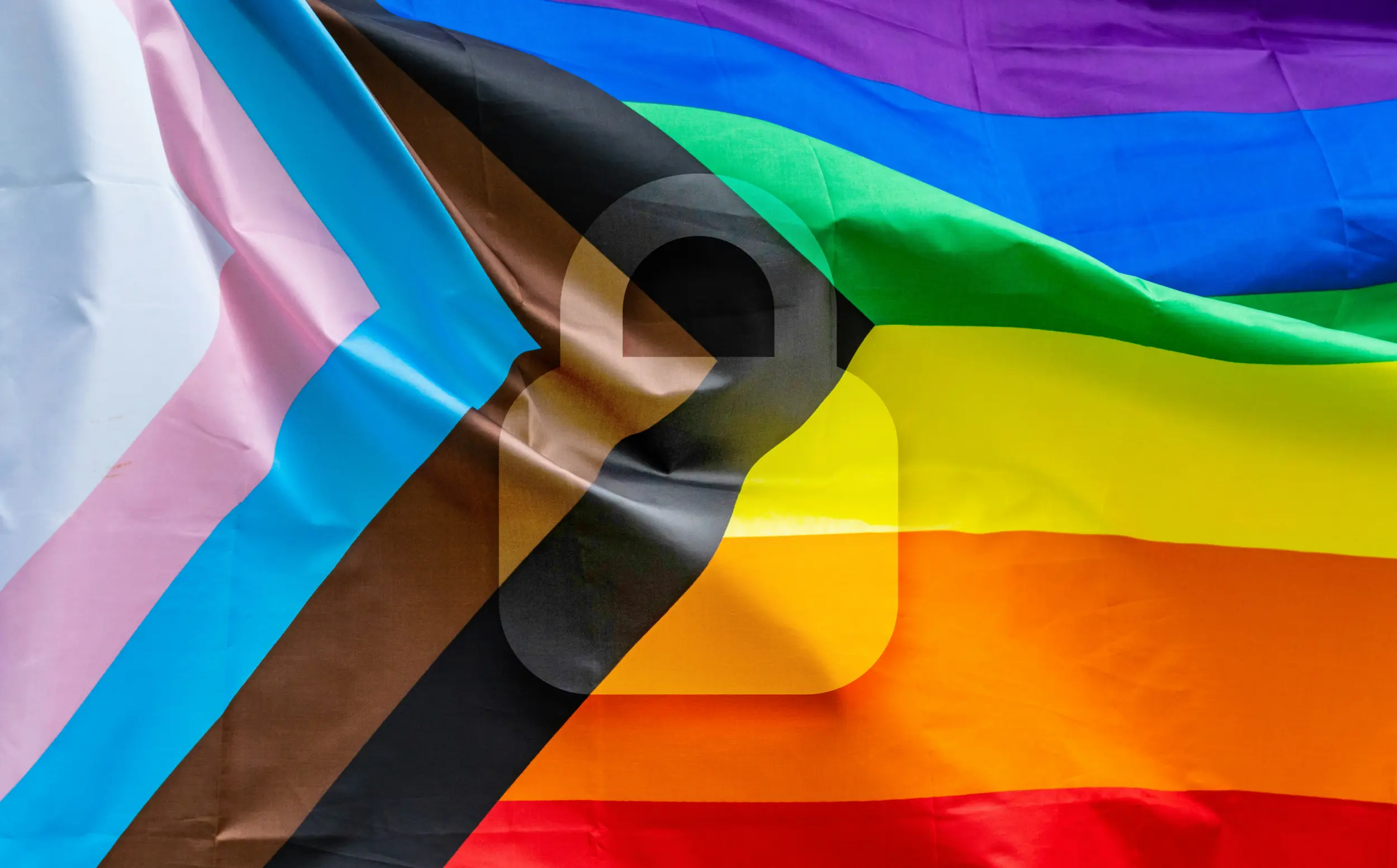 Photo of a Progress Pride Flag with a semi-transparent padlock icon over it.
